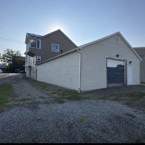 Large commercial space with garage door