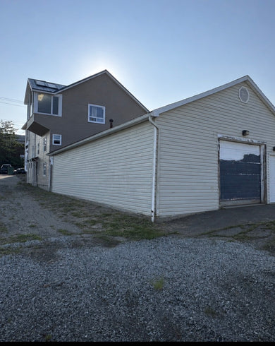 Large commercial space with garage door